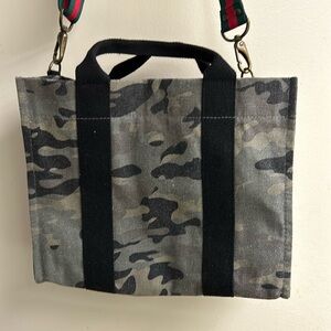 Camo tote bag. Great condition.  red nylon interior